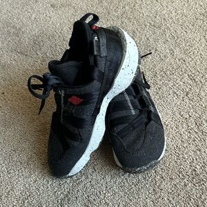 Jordan Carter Nike Black university Sneakers with Speckled White Sole